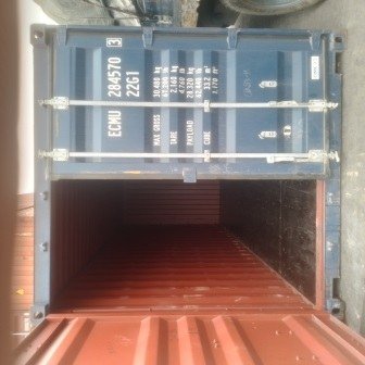 Inside an empty shipping container before loading, photo 1 of 13