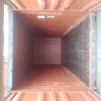 Inside an empty shipping container before loading, photo 2 of 13
