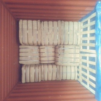 Bales of jute bags stacked inside a shipping container, photo 7 of 25
