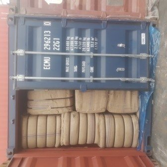 Bales of jute bags stacked inside a shipping container, photo 8 of 25