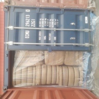 Bales of jute bags stacked inside a shipping container, photo 9 of 25