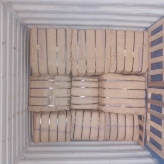 Bales of jute bags stacked inside a shipping container, photo 25 of 25