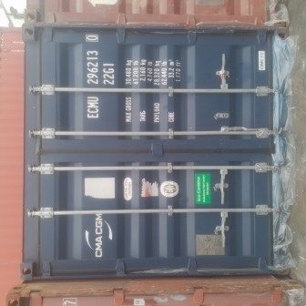 Container doors closed with a numbered seal, photo 7 of 10