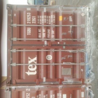 Container doors closed with a numbered seal, photo 8 of 10