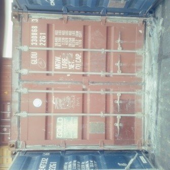 Container doors closed with a numbered seal, photo 10 of 10